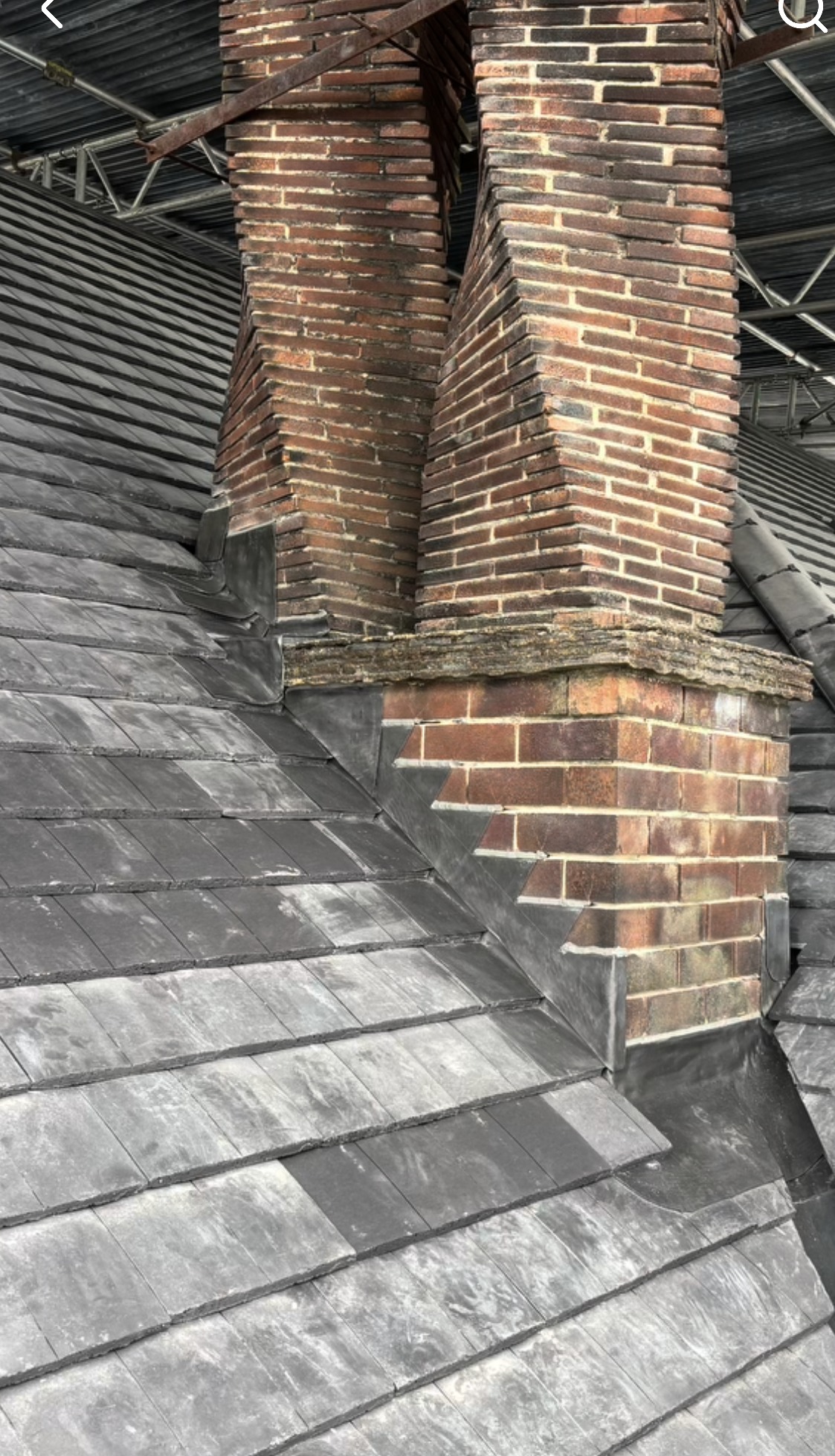 Immaculate slate roof and lead valley by Sturgeon's Roofing Solutions