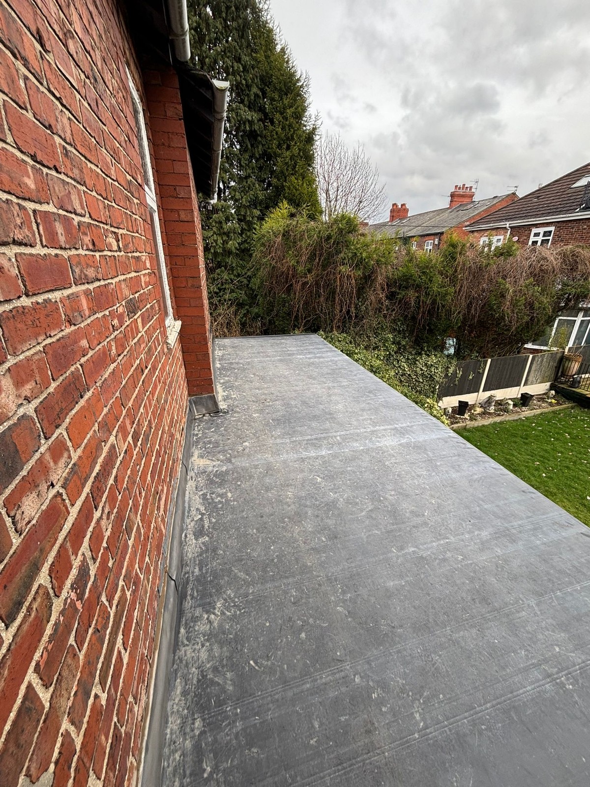 New clean EPDM rubber flat roof after the job by Sturgeon's Roofing